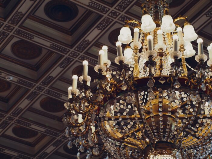 a chandelier hanging from a ceiling in a room